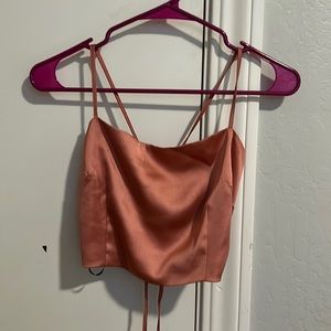 Light pink satin top with lace up back (size medium)